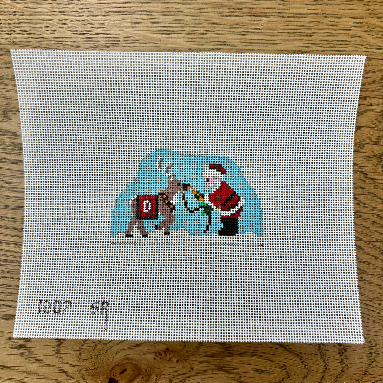 SR1207 Santa's Village, Santa Feeding Reindeer - 18 mesh - TS