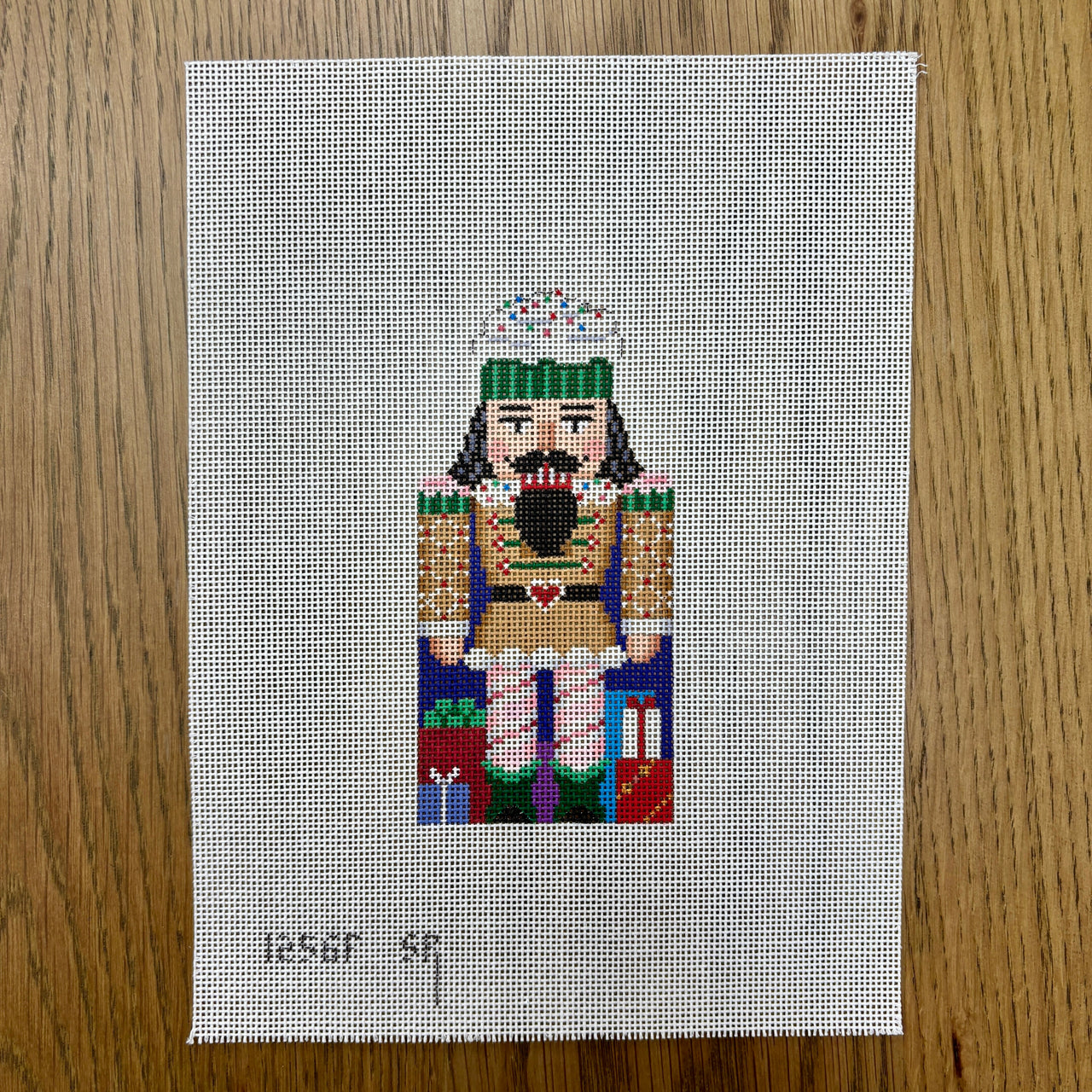 SR1256F Gingerbread Nutcracker, Front - 18 mesh - TS