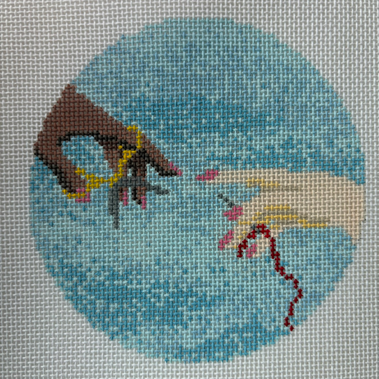 Creation of a Needlepointer Round