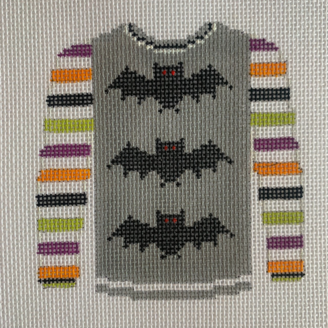 KKO220H 3 bats on gray sweater with multicolored sleeve