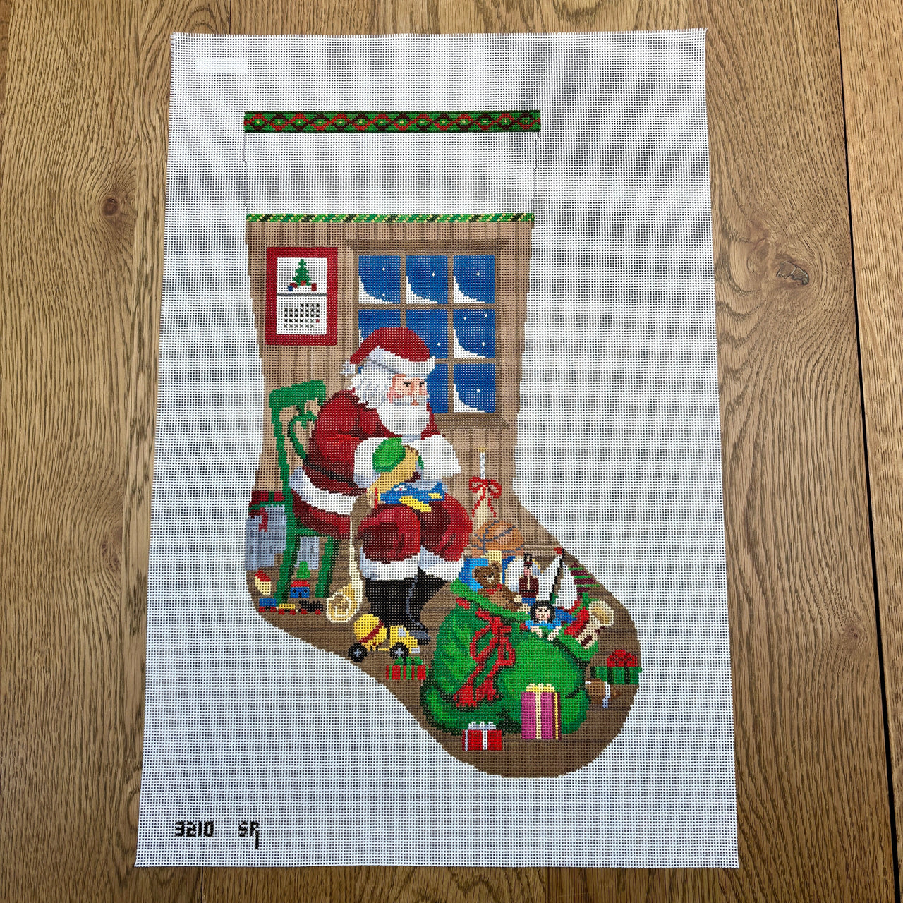 SR3210 Sitting Santa Checking His List, Stocking - TS