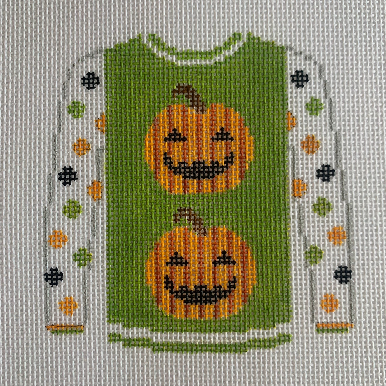 KKO220C 2 pumpkins on acid green sweater