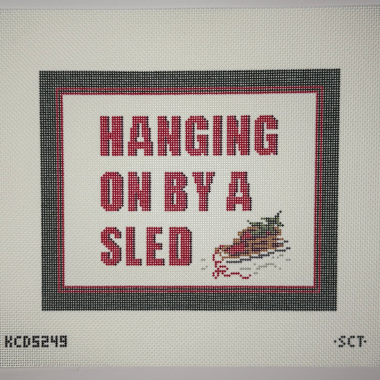 KCD5249 Hanging on By A Sled