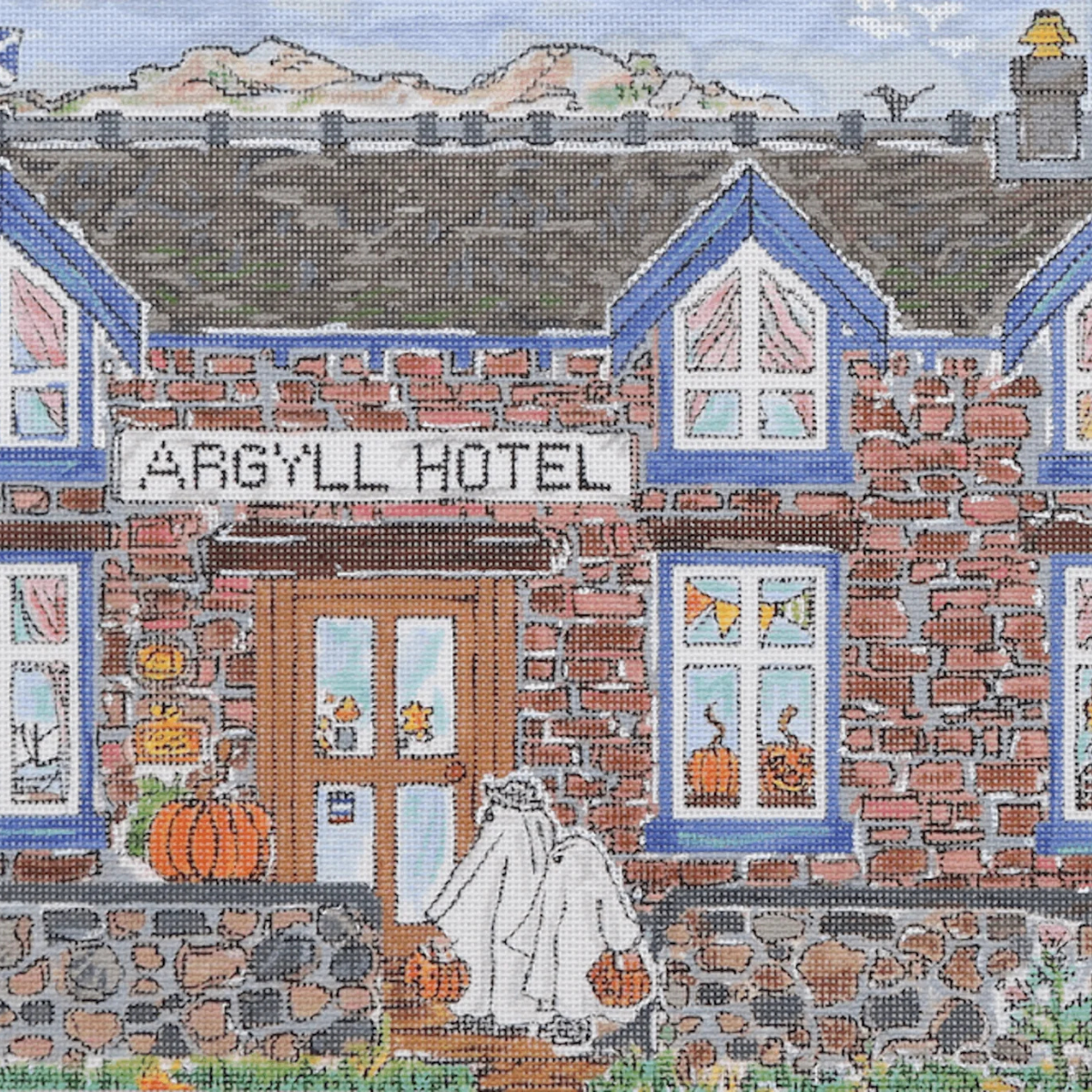 A cross-stitch style illustration of the Argyll Hotel facade, with blue-trimmed gabled windows, a brown brick wall, a wooden door, pumpkins, and a ghost holding lanterns at the entrance.