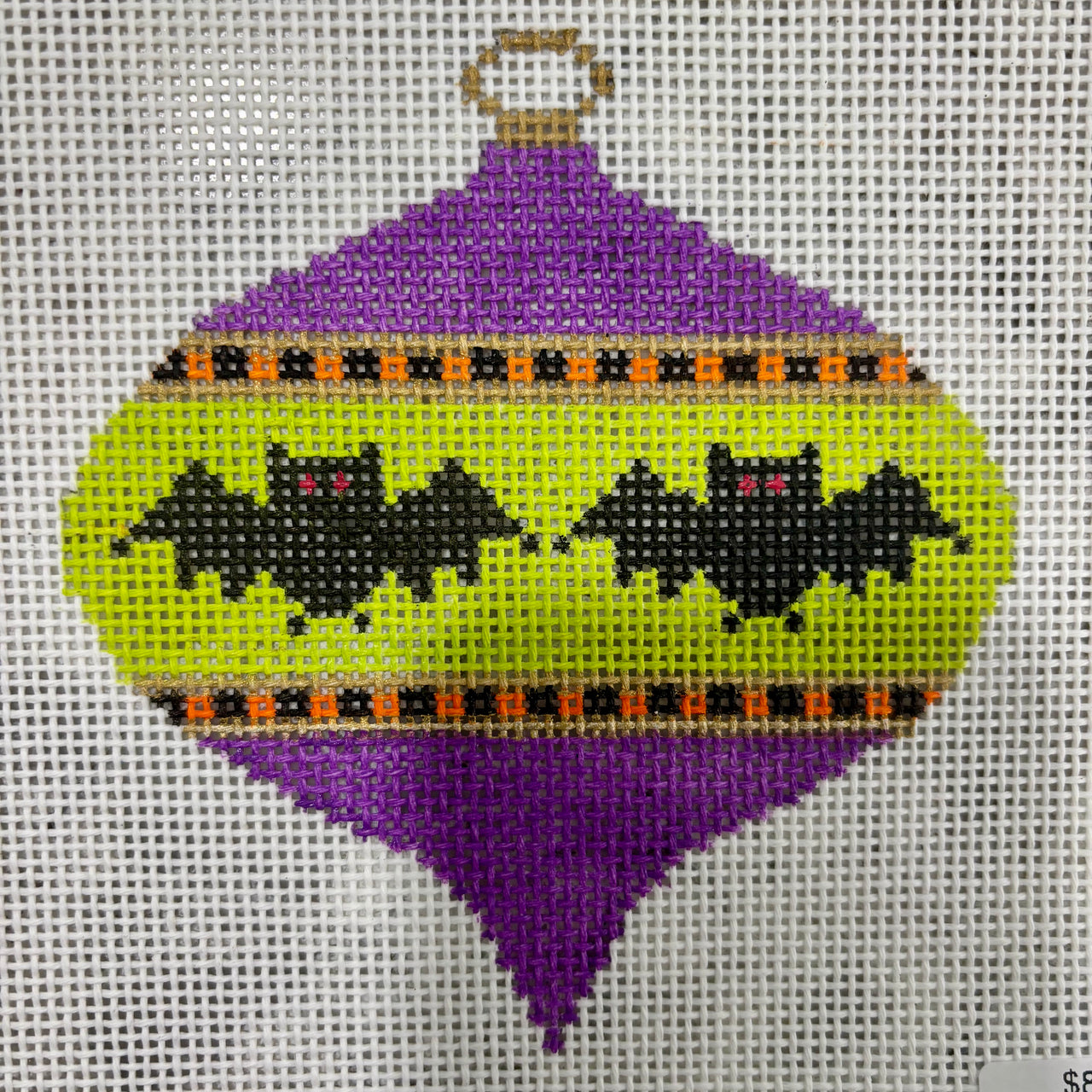KKO241B-13 Oval Bauble with Bats on Purple and Lime