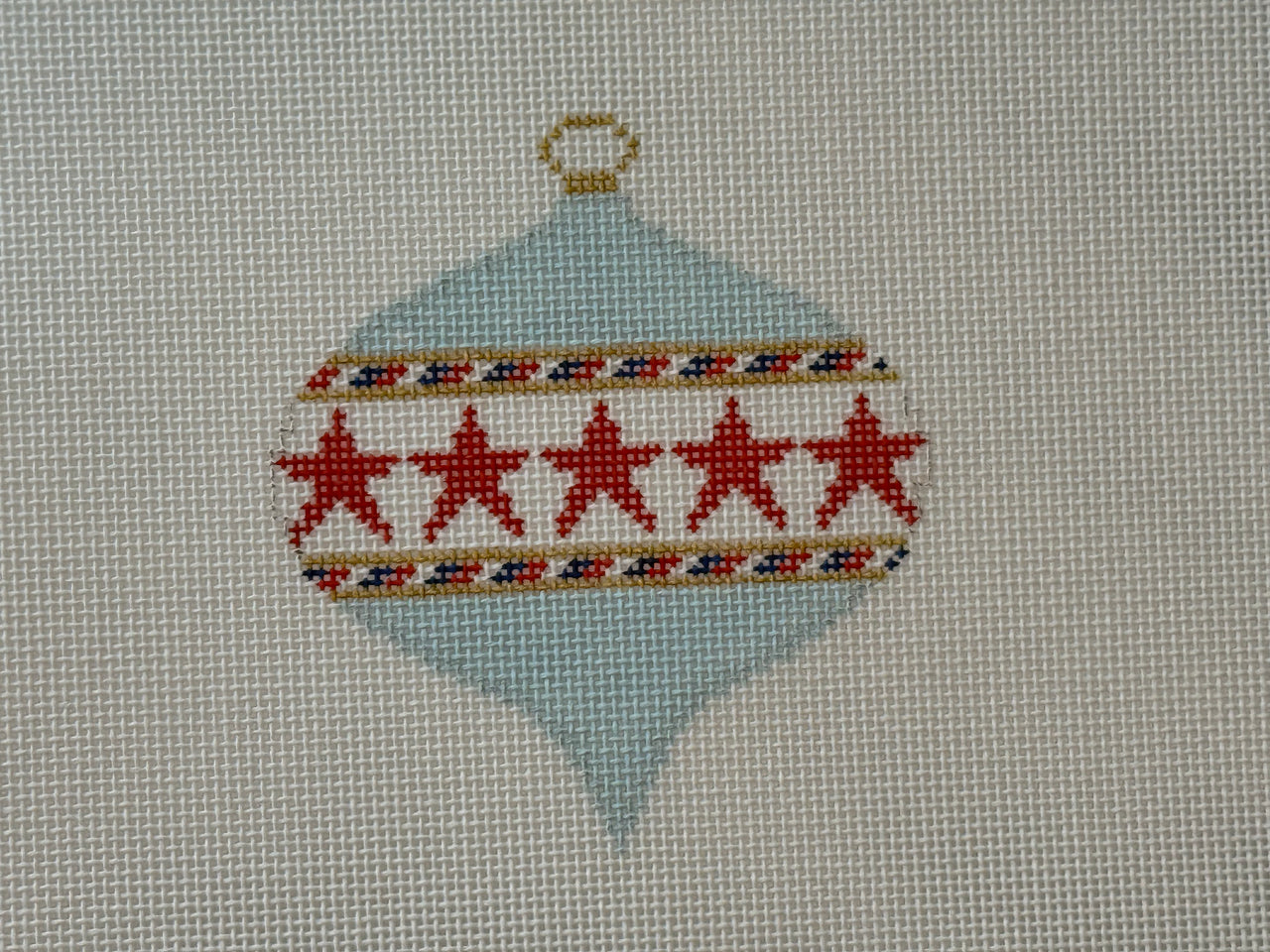 KKO252A Red Stars on Light Blue Bauble