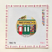needlepoint canvas with a charming book store store front
